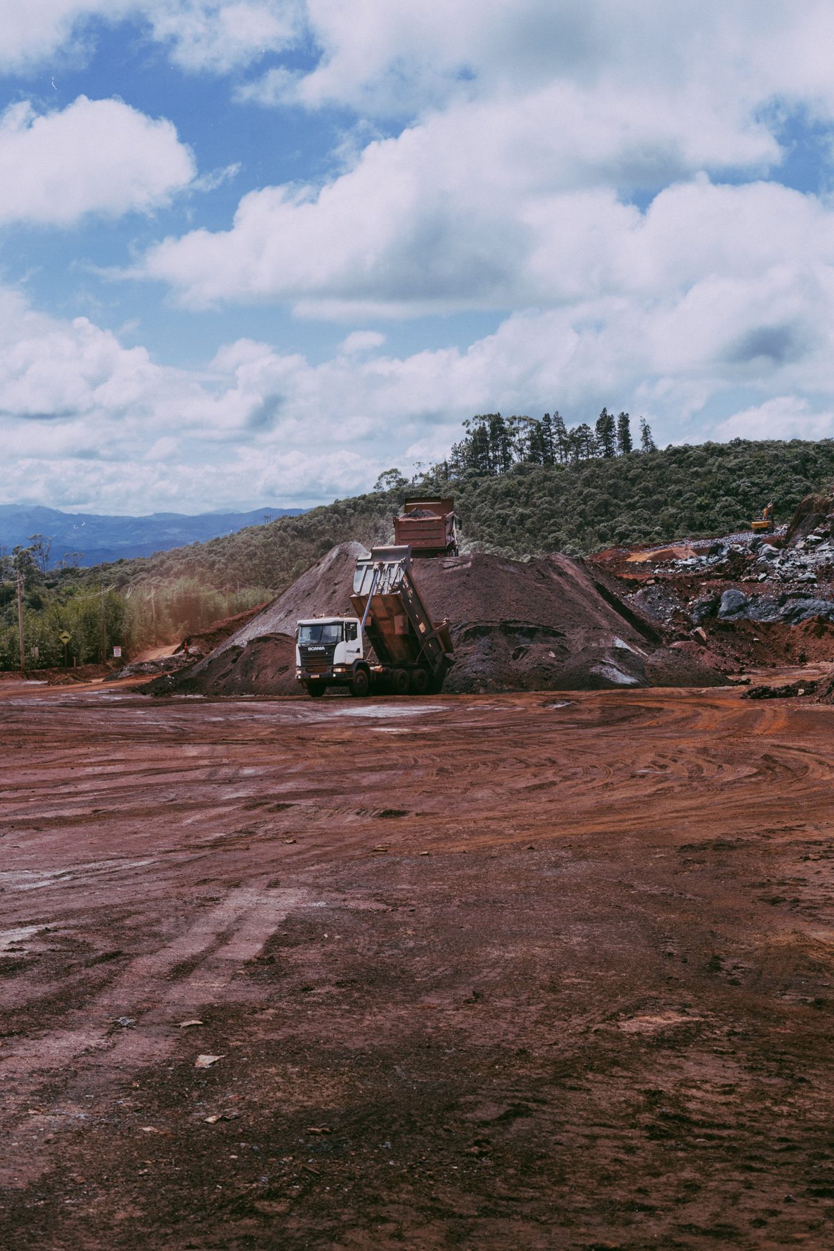 Mining trucks at an open-pit site